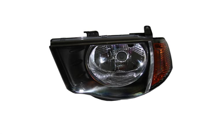Far stanga (H4, electric, fundal negru) MITSUBISHI L 200 2005-2010
